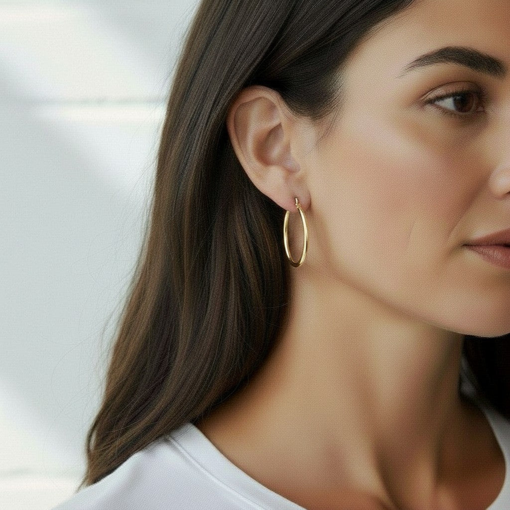 9k Yellow Gold Graduated Oval Hoop Earrings