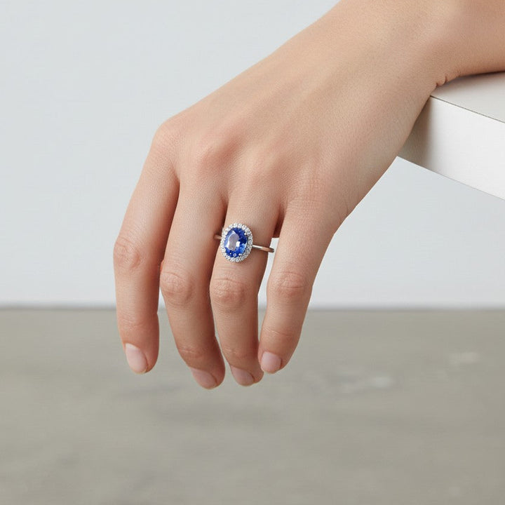 18ct White Gold Tanzanite &amp; Diamond Oval Halo Ring