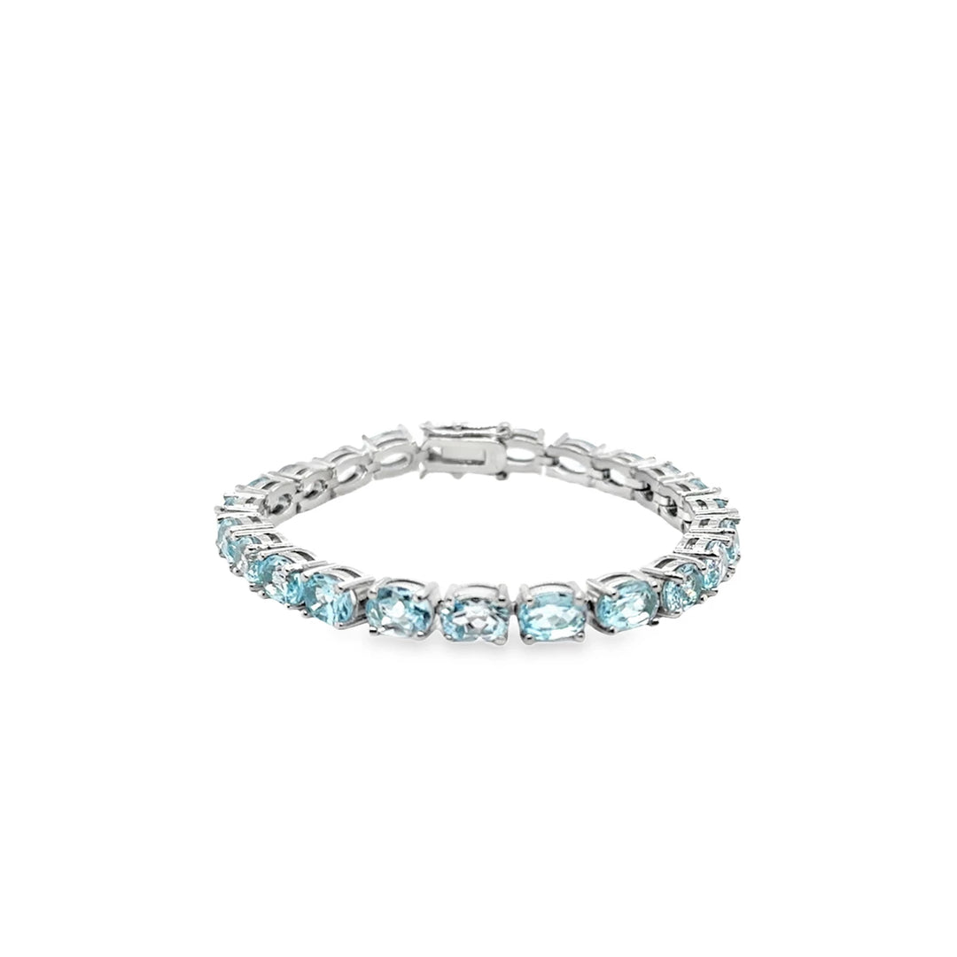 Sterling Silver Oval Blue Topaz Tennis Bracelet
