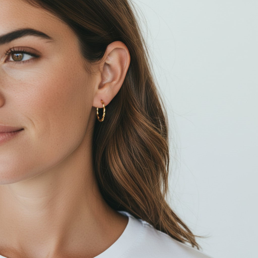 9ct Yellow Gold Twisted Oval Hoop Earrings