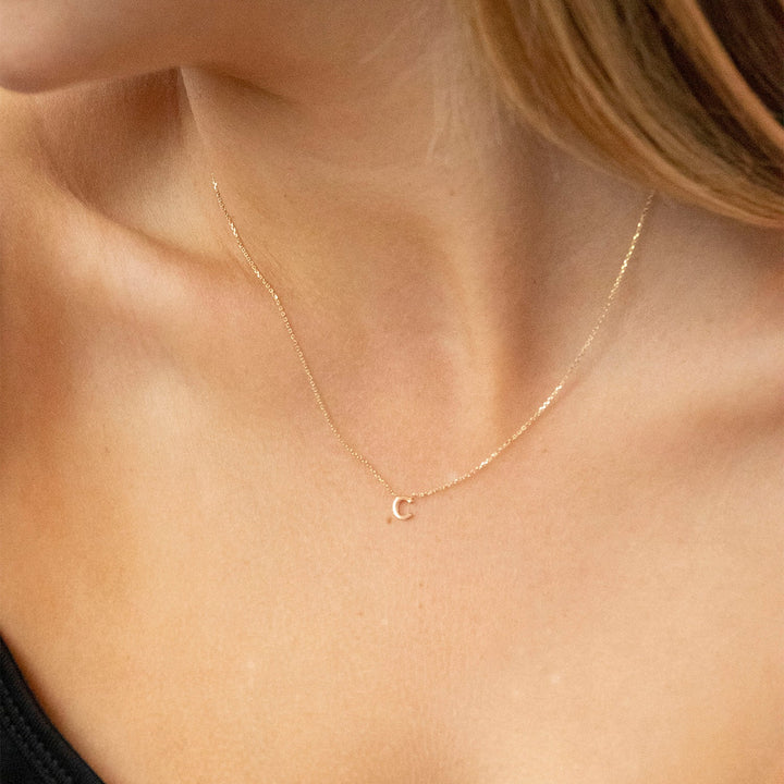9K Yellow Gold 'L' Initial Adjustable Necklace 38cm/43cm | The Jewellery Boutique Australia Model Shot